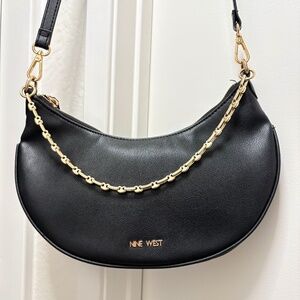 Nine West NWOT crescent shaped bag with chain accent